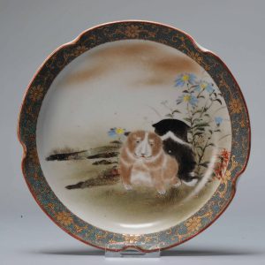 Antique Meiji period Japanese kutani plate with dogs and mark Japan 20th c